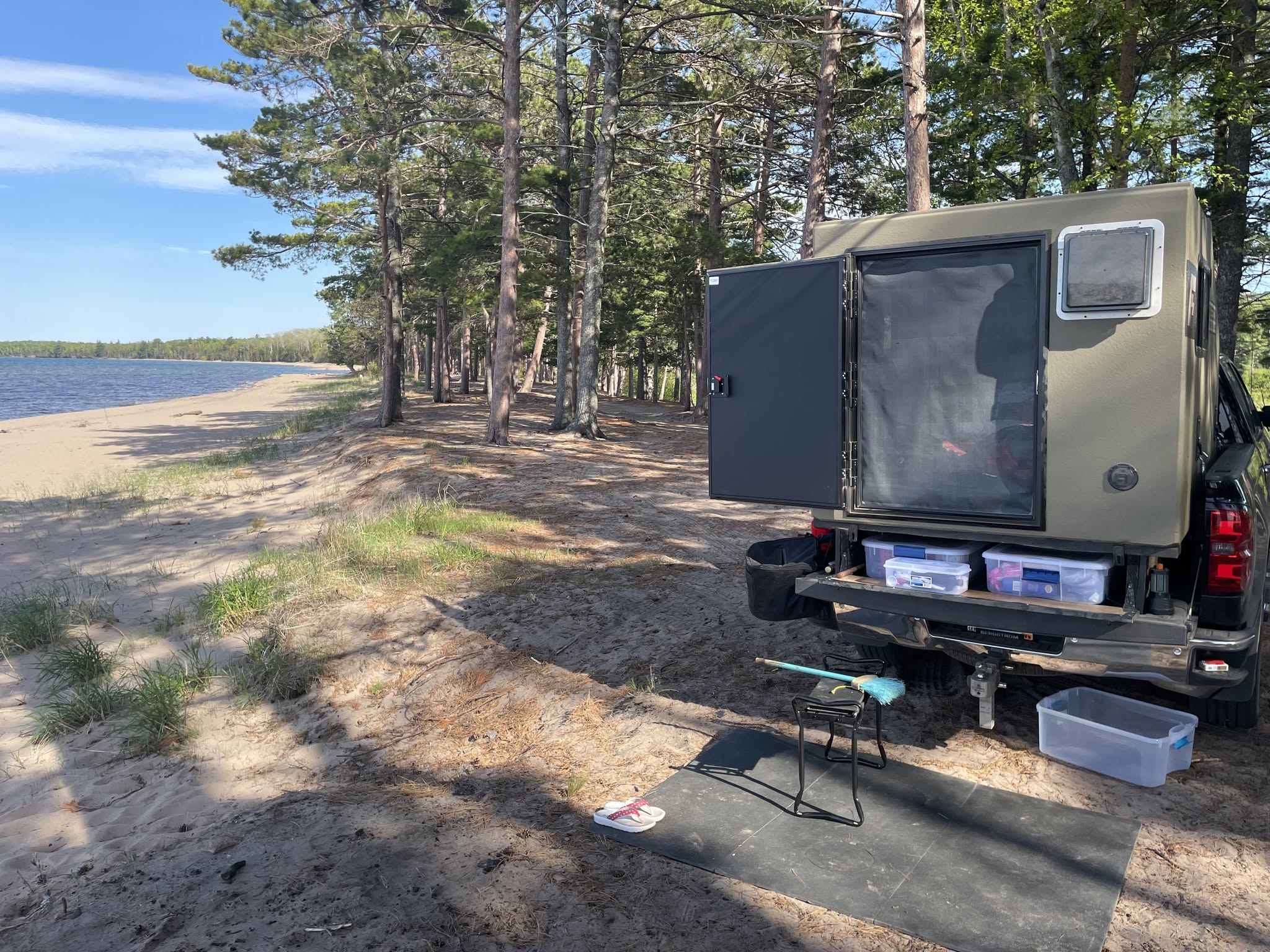 Freedom Camper camped along a Wisconsin lakeshore