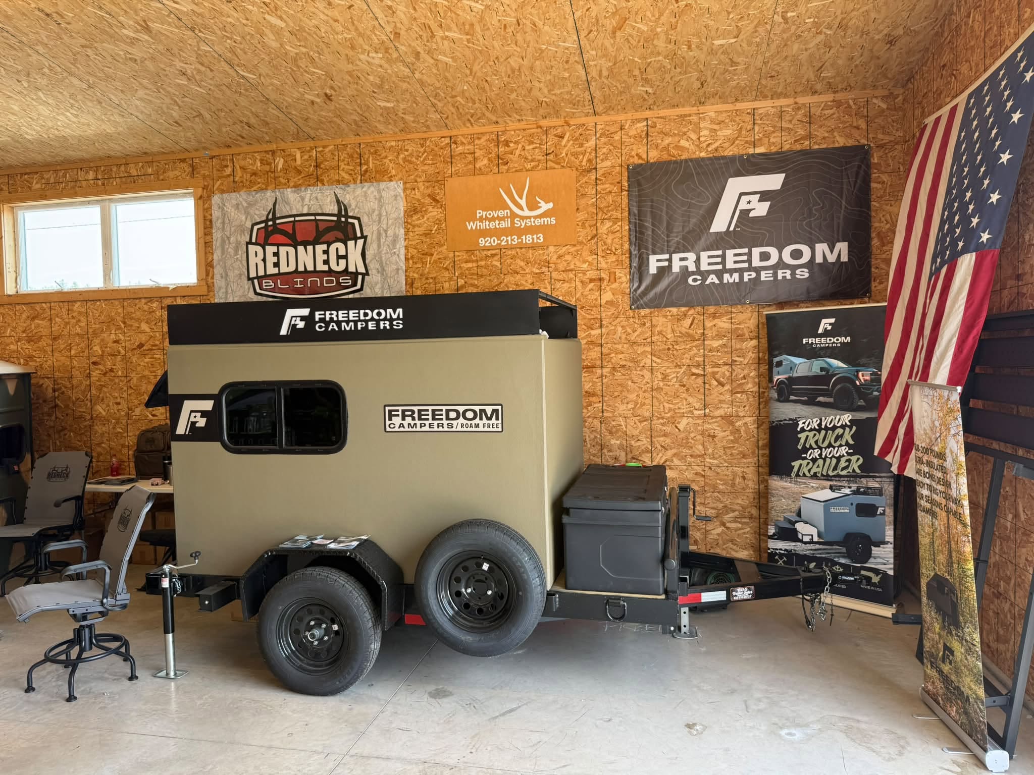 Freedom Campers POD trailer-mounted camper on display
